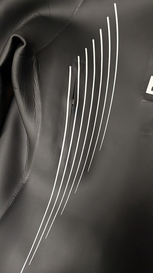 Nipple zipper installation for wetsuits
